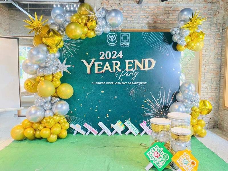 Backdrop tất niên màu xanh lá công ty thực phẩm