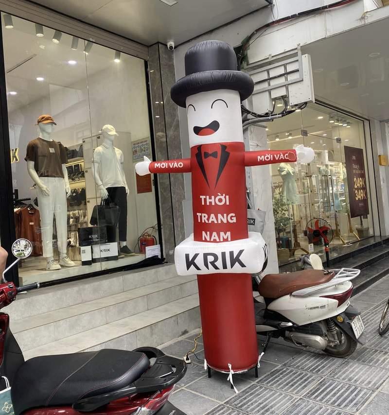 Rối hơi vẫy tay cho thuê khai trương thu hút khách hàng tại cửa hàng thời trang nam giá rẻ HCM.
