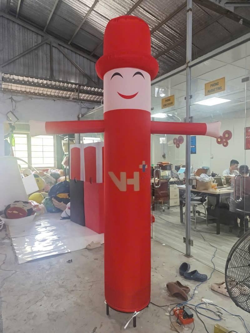 Cho thuê rối hơi khai trương màu đỏ vẫy tay thu hút khách hàng giá rẻ HCM.